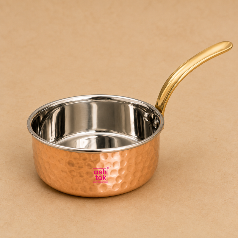 copper saucepan with brass handle