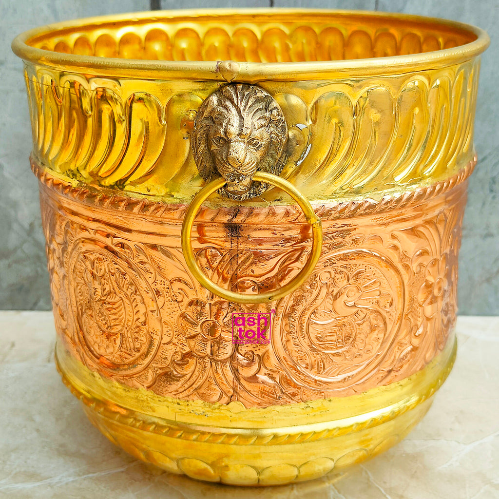 Decorative handmade brass and copper flower pot ideal for displaying plants, flowers, and greenery in modern and traditional settings.