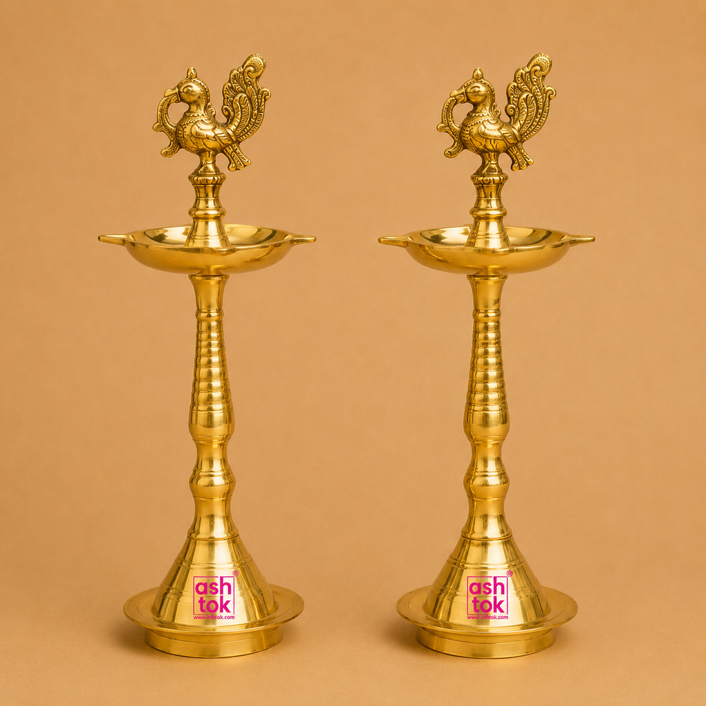 Handcrafted brass peacock deepam set of 2 featuring a traditional antique design, perfect for festive decor and daily worship.