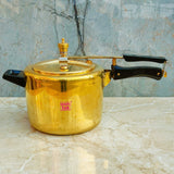 Handcrafted 5 liter brass pressure cooker featuring durable design and excellent heat retention for quick and even cooking