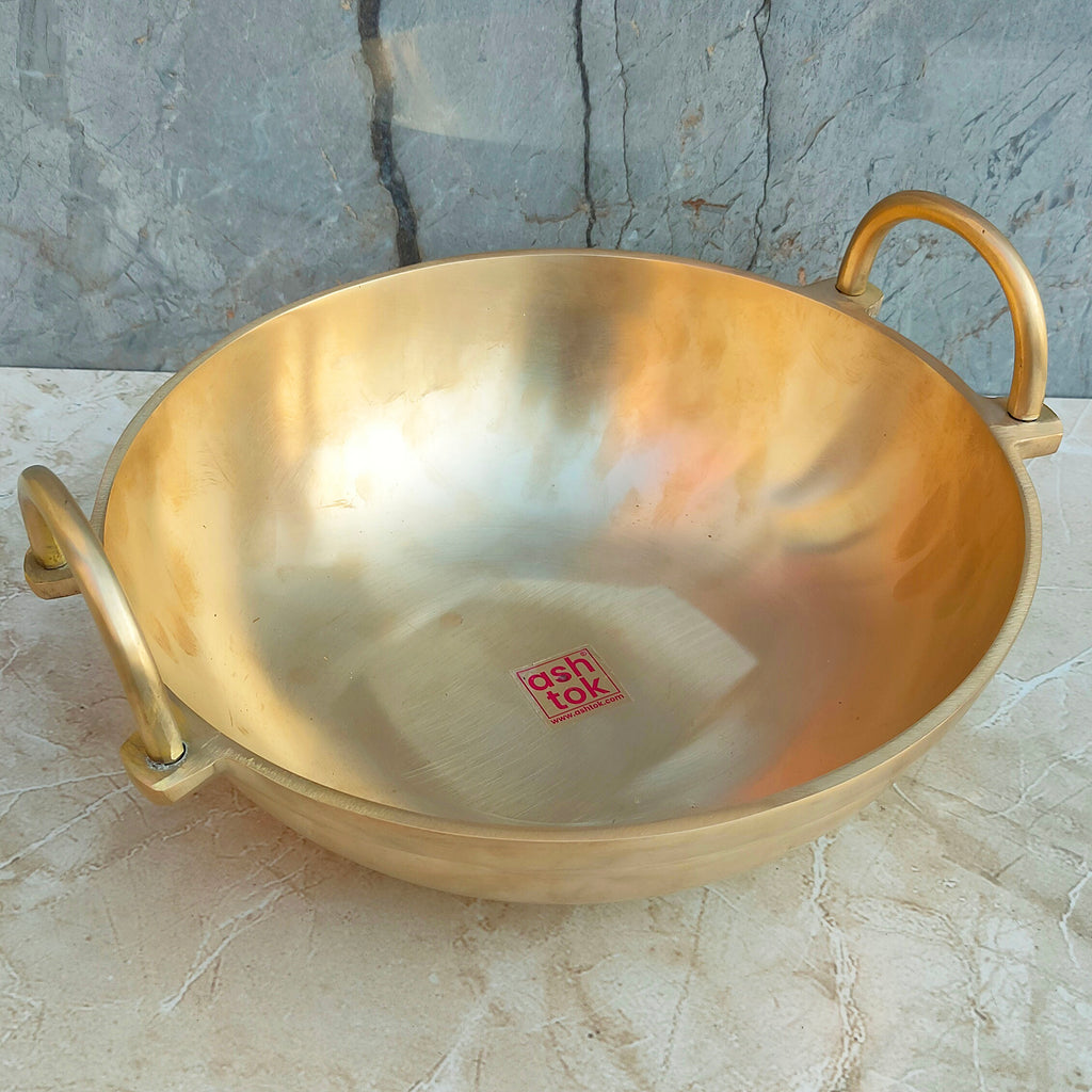 Handcrafted bronze Kansa kadai ideal for cooking curries, stir-fries, and festive dishes with traditional craftsmanship