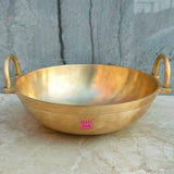 Heavy gauge bronze cooking kadai with durable construction, suitable for frying, sautéing, and slow cooking recipes