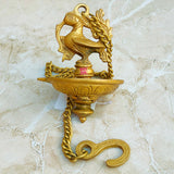 Heritage brass hanging diya handcrafted with chain, perfect for lighting during religious rituals, pooja, and traditional celebrations.