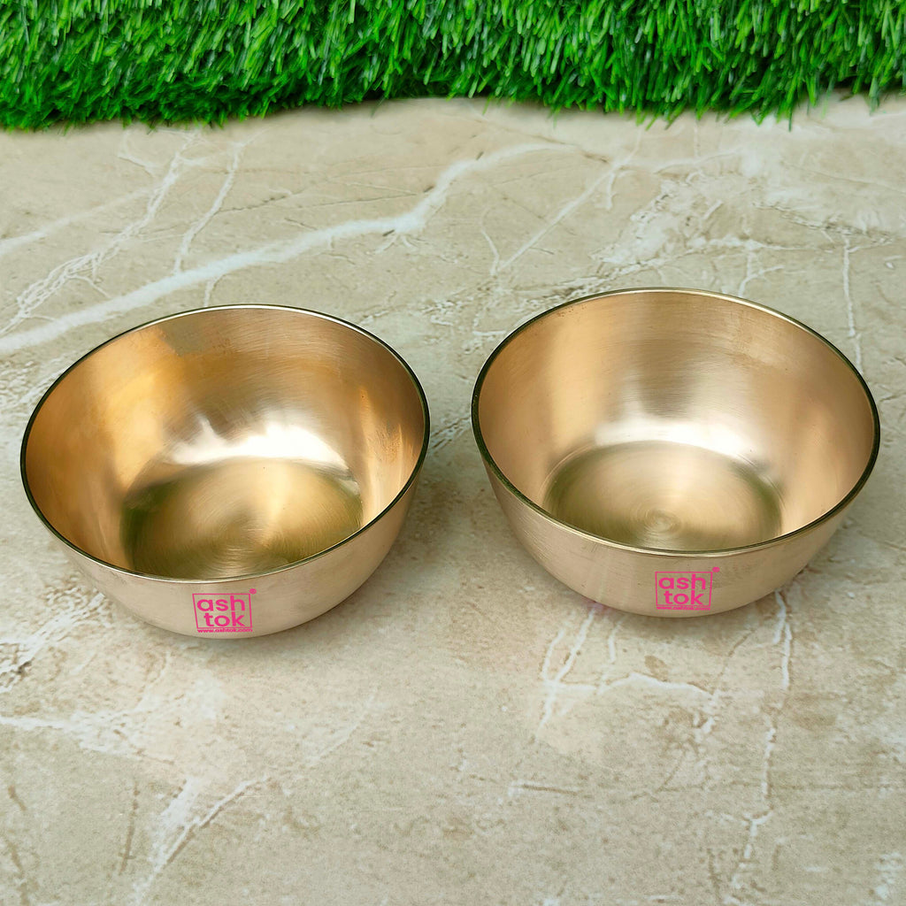 Luxury bronze Kansa bowl set with sophisticated matt finish, perfect for serving traditional Indian cuisine and snacks.