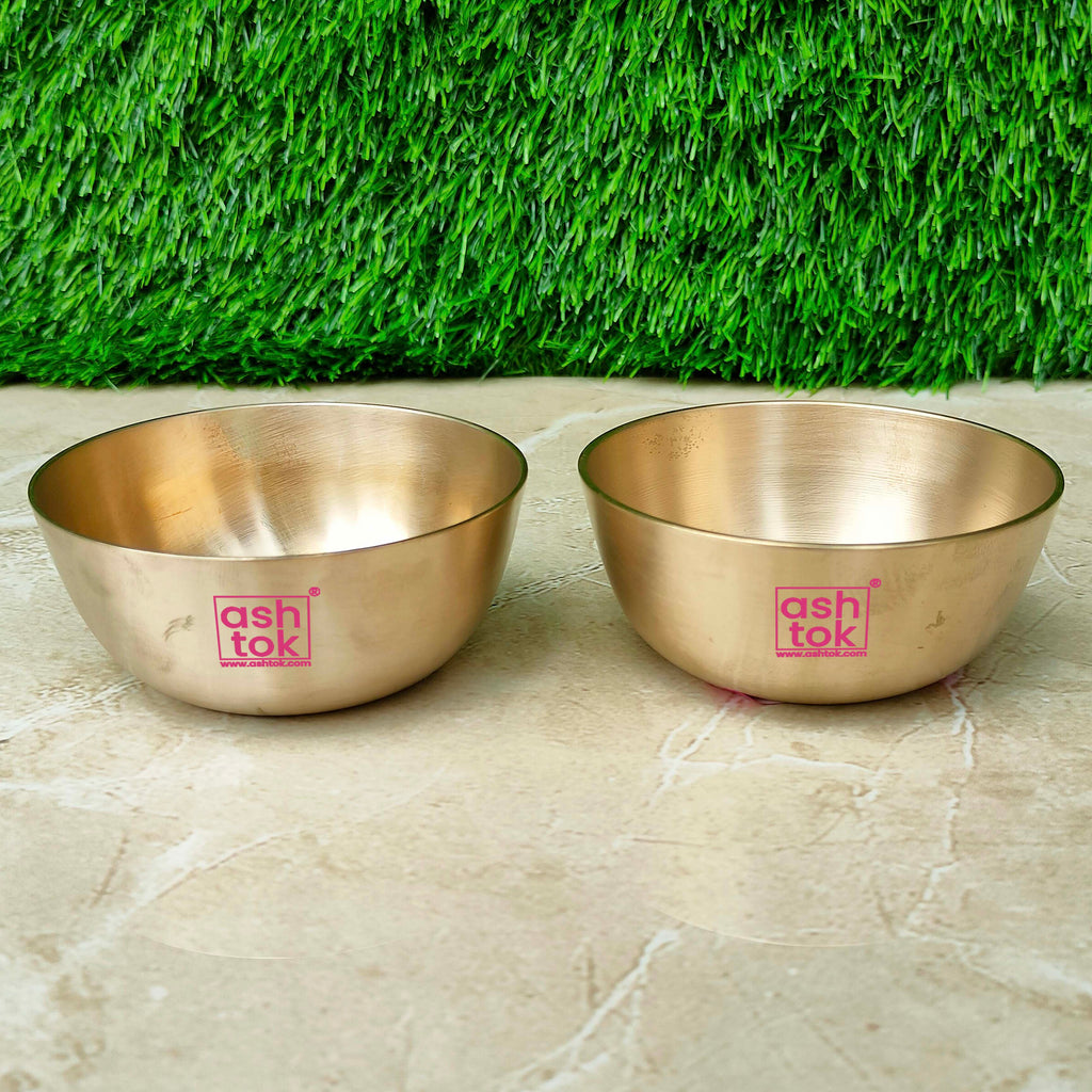 Premium bronze Kansa bowl set featuring two matt finish bowls, suitable for dining, gifting, and festive occasions.