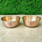 Premium bronze Kansa bowl set featuring two matt finish bowls, suitable for dining, gifting, and festive occasions.
