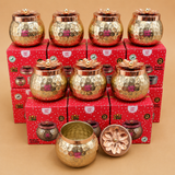 Set of gold-colored decorative jars with red boxes