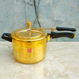 Traditional brass pressure cooker with 5 litre capacity, suitable for cooking rice, lentils, curries, and vegetables.