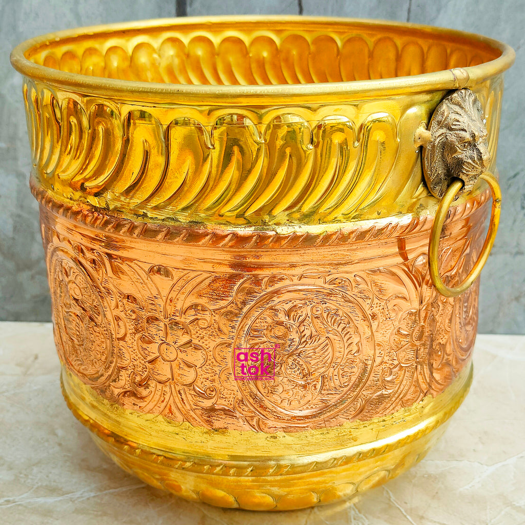 Traditional brass and copper planter suitable for flowers, herbs, and decorative plants in homes, patios, and gardens.