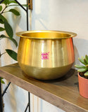 Traditional bronze cooking handi designed for preparing biryani, rice, curries, and festive dishes in Indian kitchens.
