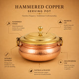 Traditional copper cooking handi with brass lid for preparing biryani, rice dishes, and large family meals.