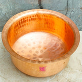 Traditional hammered copper tope crafted for authentic Indian cooking, featuring durable construction and timeless appeal.