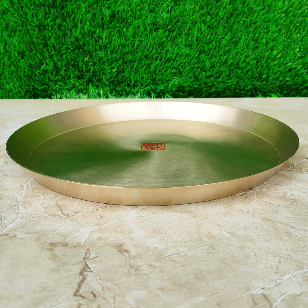 Traditional pure bronze Kansa thali with inclined design and matt finish, crafted for elegant and authentic dining experiences.