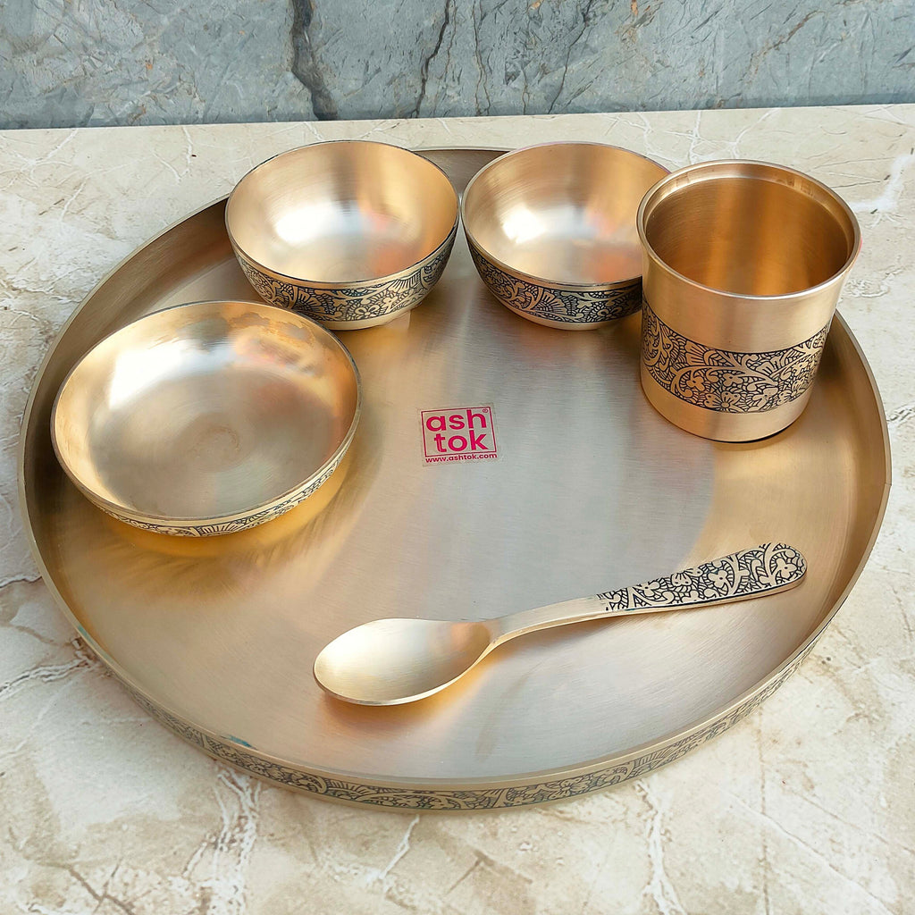 Traditional pure Kansa thali set with artistic etched detailing, ideal for daily meals, festive dining, and cultural occasions.