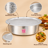 Detailed features image of an Aluminium Biryani Handi with Lid highlighting its traditional hammered aluminium exterior, wide circular cooking surface, broad rim and matching flat metal lid. Close-up illustrations showcase the distinctive circular hammered texture across the vessel body, smooth inner surface and classic round cooking pot construction.