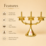 Size guide for Ashtok brass 3-face diya stand indicating 10 inches length, 7.5 inches height, and 3.5 inches width.