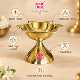 Ashtok brass diya features image highlighting brass finish, traditional diya design, petal edge design, footed base and suitability for pooja and gifting on a beige background.