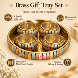 Features image of ASHTOK brass gift tray set with 4 bowls and lids, highlighting hammered texture, decorative multi-tone design and suitability for gifting and serving, presented on a beige background.