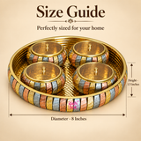 ASHTOK brass gift tray size guide showing tray diameter 8 inches and tray height 1.5 inches, featuring a round brass tray with 4 matching lidded bowls in a decorative multi-tone metallic finish on a beige background.