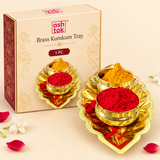 ASHTOK brass kumkum tray 1 piece gift pack featuring a polished leaf-shaped brass tray with two round bowls filled with red kumkum and yellow haldi, suitable for pooja, home mandir use, festivals, weddings and traditional gifting.