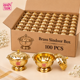 ASHTOK brass sindoor box 100 pieces quantity variant image showing a large box packed with 100 brass sindoor boxes, with a few pieces displayed outside, suitable for wholesale orders, bulk gifting, return gifts and festive packaging.