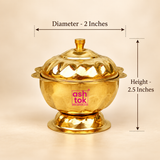 ASHTOK brass sindoor box size guide image showing 2 inch diameter and 2.5 inch height, featuring a polished golden brass finish, round shape, decorative lid, footed base and compact design suitable for kumkum and sindoor storage.