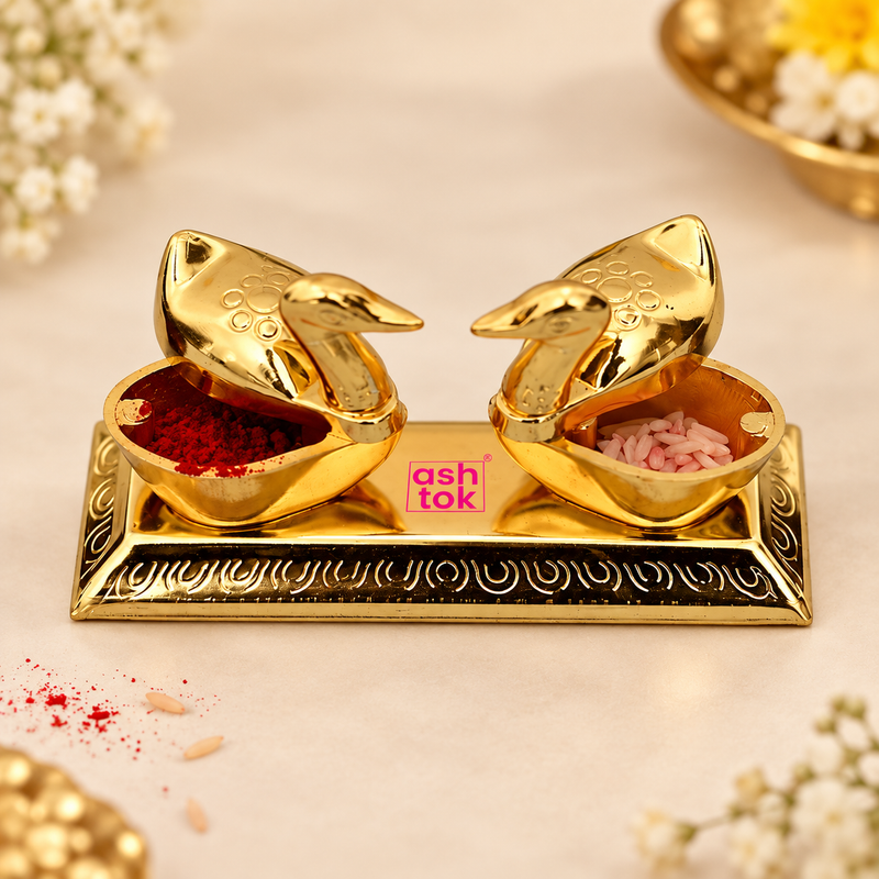 Feature image of Ashtok brass sindoor box in double duck design made from polished brass, showing dual compartments for kumkum and akshat, lid included, traditional design, and suitability for pooja and auspicious occasions, displayed on a clean beige background.