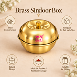 Ashtok Brass Sindoor Box features image highlighting the premium brass construction, compact 2 x 2 x 2 inch size, practical lidded design, suitability for sindoor and kumkum storage and use as a traditional gifting item. The polished golden brass container is shown prominently in the center with a glossy premium finish, curved round base, matching dome-shaped lid, small top knob and clearly visible pink Ashtok logo. The surrounding feature icons explain the product benefits in an easy-to-understand format, 