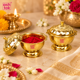 ASHTOK brass sindoor box lifestyle image displayed in a festive setting with kumkum powder, traditional decor and floral elements, showing the round brass container with lid as an elegant choice for pooja use, sindoor storage and home rituals.