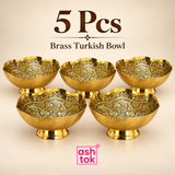 Five-piece quantity image of the Ashtok Brass Turkish Bowl arranged together on a warm beige background, showing 5 matching decorative brass bowls with scalloped rims, intricate floral patterned interiors, polished golden finishes and stable pedestal bases. This 5 Pcs set is suitable for small return gift requirements, family gifting, festive functions, wedding giveaways, housewarming gifts, corporate hampers or coordinated serving arrangements, offering an elegant traditional gift option that can also be u