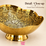 Close-up image of the Ashtok Brass Turkish Bowl showing the intricate floral and leaf engraving across the inner surface, detailed scalloped edge, richly polished golden brass finish and smooth pedestal construction in sharp detail. The image focuses on the ornate traditional pattern, textured metalwork, curved bowl form and reflective brass craftsmanship, allowing customers to closely examine the decorative quality and finishing of this premium Turkish-style bowl designed for dry fruit serving, festive pre