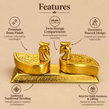 Feature infographic image of a brass twin peacock haldi kumkum box on a soft beige background, designed to highlight the main product benefits and decorative appeal. The image clearly shows the premium brass finish, twin storage compartments for keeping haldi and kumkum separately, embossed traditional pattern work, elegant peacock head design on each lid and gifting suitability for pooja, festive occasions and ceremonial use. The polished golden surface and ornamental base give the product a rich heritage 
