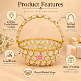 Product features image of Ashtok crystal basket gift item highlighting crystal embellished design, arched handle, gold finish, round basket shape and ideal gifting use, shown on a beige background.