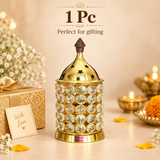 1 Pc gifting image of the ASHTOK Crystal Diya Brass displayed in an elegant festive setup on a warm beige background. The single diya is placed in the center with decorative gift-style props such as flowers, soft lights and festive elements around it, showing the product as a thoughtful gift item. The image highlights that even a single piece can be used as a premium festive gift for pooja occasions, return gifts, celebrations and elegant home decor.