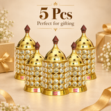 5 Pcs ASHTOK Crystal Diya Brass set displayed together in a beautifully arranged gifting presentation on a beige background. The five matching crystal brass diyas are grouped neatly to show the quantity clearly, with decorative gift-style styling that makes the image suitable for festive gifting, return gifts and event gifting. The long visual presentation emphasizes the premium polished brass finish, sparkling crystal body and decorative star-cut tops across all five pieces.