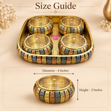 Size guide image of the Ashtok Gift Bowls Tray set showing a decorative square tray with four matching multitone lidded bowls, along with a close-up of one bowl marked with measurements of 4 inches diameter and 2 inches height on a beige background.