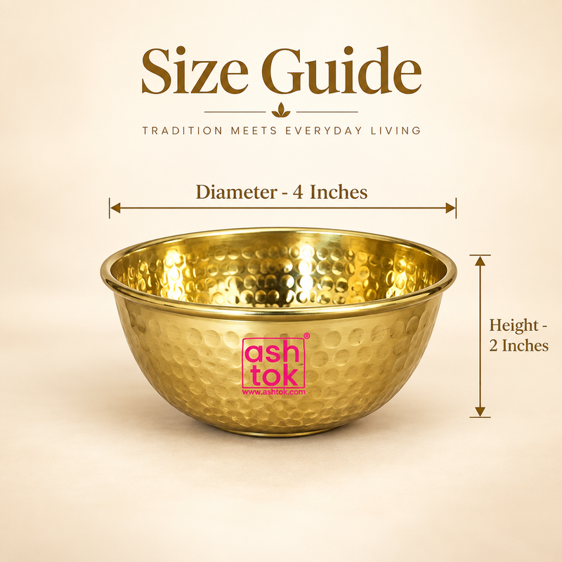 ASHTOK hammered brass bowl size guide showing 4 inch diameter and 2 inch height, featuring a polished golden brass finish, hand-hammered texture, round katori shape and smooth rolled rim for serving, pooja and gifting use.