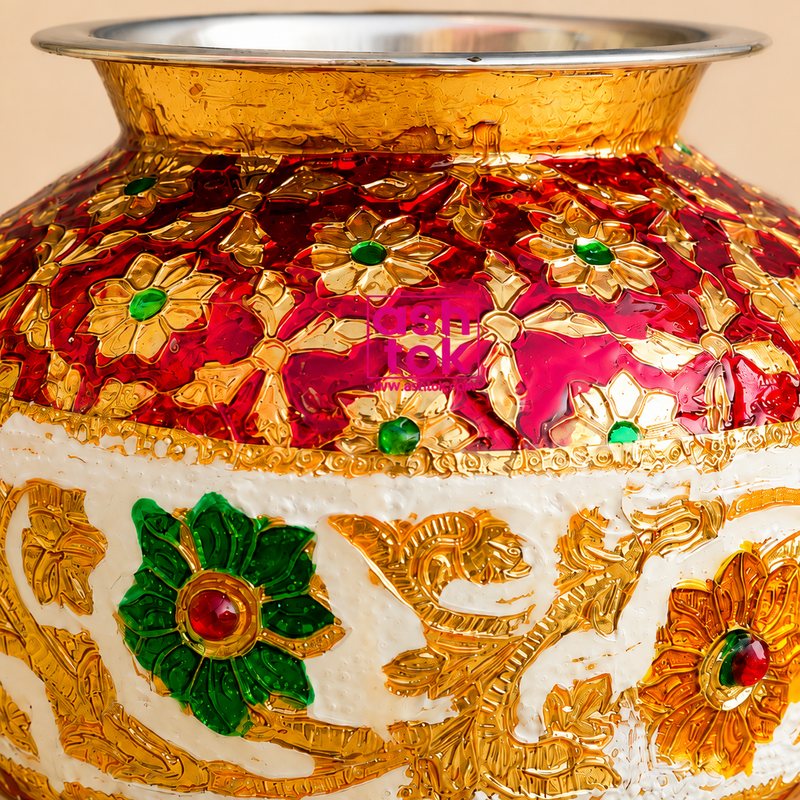 Close-up of ASHTOK Meenakari ghada showing detailed red gold white and green floral artwork