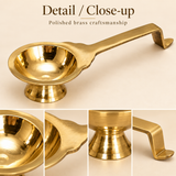 Close-up of Brass Aarti Diya highlighting polished brass craftsmanship, bowl shape, pedestal base and handle detail.