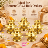 Brass agarbatti stands arranged for return gifts, festive gifting and bulk orders with ASHTOK branding.