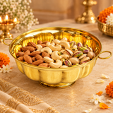 Brass Bowl 7 Inch Decorative Serving bowl styled in a festive setting and filled with dry fruits, showing its use for serving snacks, sweets, and festive treats.