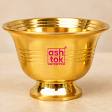 Detailed close-up of Brass Chandan Bowl highlighting the polished golden surface, flared rim, smooth rounded body, subtle ring detailing and sturdy pedestal base, showing the traditional craftsmanship and premium finish of the bowl.