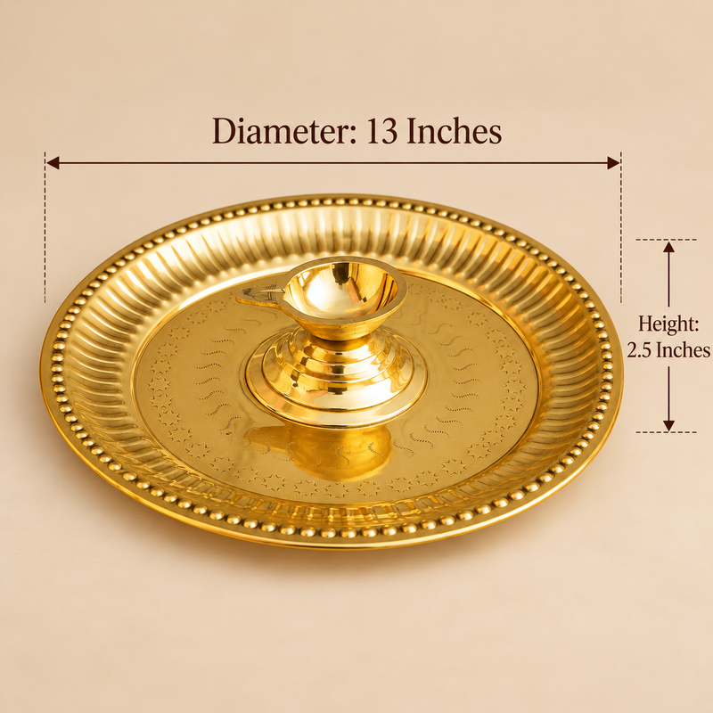 Size guide of a traditional brass diya with attached pooja plate showing a diameter of 13 inches and an overall height of 2.5 inches. The golden brass thali features a decorative beaded outer rim, fluted border, engraved star-shaped patterns and a central raised brass diya cup with a small pouring spout. The image highlights the dimensions and traditional design of this brass pooja accessory for daily worship, religious rituals and festive celebrations.
