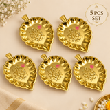 Set of 5 brass leaf trays arranged on a premium beige background, each featuring a polished golden finish, leaf-shaped design, scalloped border and embossed Ganesh centerpiece, suitable for festive gifting and return gifts.