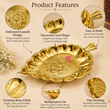 Features image of brass Ganesh leaf tray highlighting the embossed Ganesh design, decorative leaf-shaped form with raised scalloped edge, sturdy leaf-style handle, polished brass finish, fine traditional detailing and multipurpose use for pooja, home decor, festive gifting and return gifts.