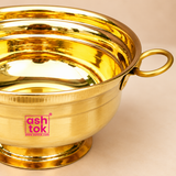 Detailed close-up of Brass Gangal highlighting the smooth polished interior, rounded brass body, circular side handle, decorative rim and stable pedestal base, showing the craftsmanship and premium golden finish.