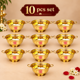 Set of 10 Brass Gangal bowls displayed in an organized beige studio arrangement, featuring matching polished brass bowls with circular handles and pedestal bases for puja functions, festive gifting and bulk orders.