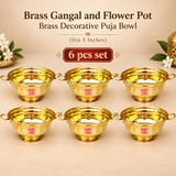 Set of 6 Brass Gangal decorative puja bowls arranged neatly on a premium beige studio background, each featuring a polished golden finish, dual side handles and pedestal base for festive gifting and religious functions.