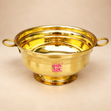 Brass Gangal and Flower Pot with a polished golden finish, wide round bowl, two circular side handles and stable pedestal base, professionally presented on a premium beige studio background for puja, floral decoration and traditional home decor.