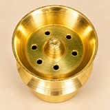 Detailed top view of a Brass Kalash Shape pooja holder featuring a wide polished brass circular rim, smooth reflective interior, raised cone-shaped central holder, and six round openings arranged around the centre. The traditional golden brass item highlights precise circular detailing, a symmetrical interior layout, and a compact design suitable for daily worship, home mandir arrangements, and traditional pooja accessories.
